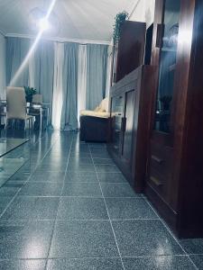 a living room with a couch and a table at Las Fadrique in Córdoba