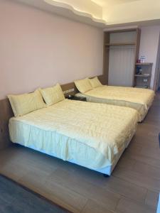 Postel nebo postele na pokoji v ubytování Shun Cheng Hotel
