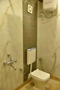 Koupelna v ubytování Tarapith Tapabon Eco Resort