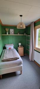 Postel nebo postele na pokoji v ubytování Wild Power Guesthouse