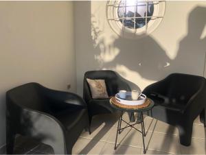 Zona d'estar a T2 Rez de jardin vue mer