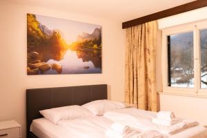 Posteľ alebo postele v izbe v ubytovaní homy MontaVista - 300m zur Golmerbahn
