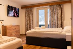 Posteľ alebo postele v izbe v ubytovaní homy MontaVista - 300m zur Golmerbahn