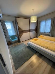 Postel nebo postele na pokoji v ubytování Ascona Casa Cristina