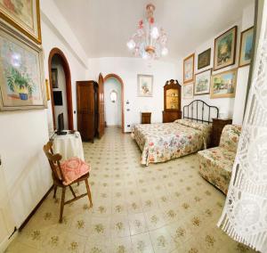 Ένα ή περισσότερα κρεβάτια σε δωμάτιο στο Casa Amore Amalfi Coast