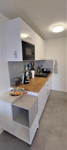 Kuchyň nebo kuchyňský kout v ubytování Apartmán Na kraji lesa