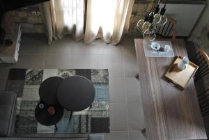 an overhead view of a dining room table and chairs at Halkidiki Luxurious Stonehouses in Psakoudia +29 photos