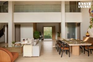 Χώρος καθιστικού στο Reflection House by StayVista with Pool, Terrace bar, Indoor games & Exquisite interiors in a nutshell