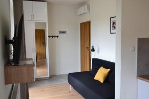 Χώρος καθιστικού στο Apartamenty na Ceglanej