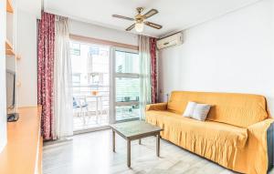 Et opholdsområde på Lovely Apartment In Roquetas De Mar