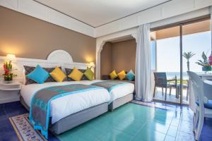 Dunes d'Or Ocean Club客房内的一张或多张床位