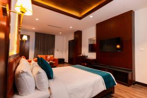 Krevet ili kreveti u jedinici u okviru objekta Galaxy Garden Resort