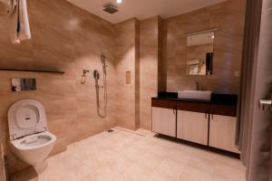 Kupatilo u objektu Galaxy Garden Resort