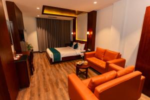 Prostor za sedenje u objektu Galaxy Garden Resort