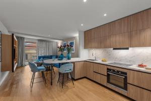 Η κουζίνα ή μικρή κουζίνα στο Town House Apartments