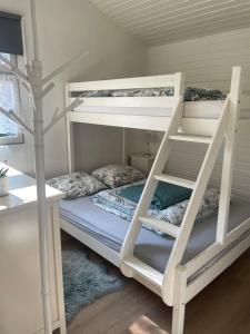 Postel nebo postele na pokoji v ubytování Chalet Sint-Hubertus