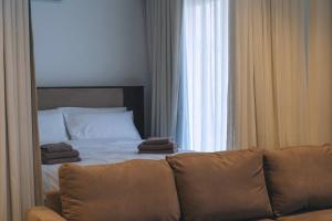 Krevet ili kreveti u jedinici u okviru objekta Water's Edge Suite Xlendi with Direct Sea Access