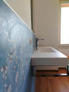 Postel nebo postele na pokoji v ubytování Torres Rooms Sassari