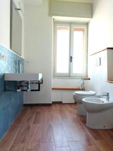 Koupelna v ubytování Torres Rooms Sassari + 6 fotografií