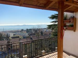 a balcony with a view of a city at Il Viandante in Recanati