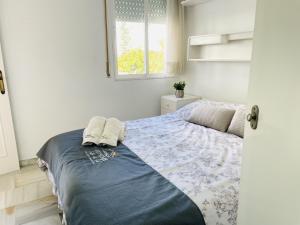 Ένα ή περισσότερα κρεβάτια σε δωμάτιο στο Apartamento Laguna Beach at Home +40 φωτογραφίες