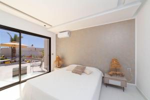 Postel nebo postele na pokoji v ubytování Villa Haut Standing Rock The Kasbah, Djerba Tunisie + 87 fotografií