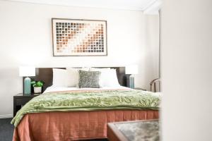 Ένα ή περισσότερα κρεβάτια σε δωμάτιο στο TWN Cairns Central Condo 1101 and 1102