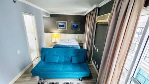 Postel nebo postele na pokoji v ubytování HOTEL PERDIZES - FLAT Executivo - 1204