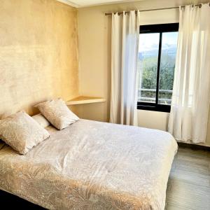 Postel nebo postele na pokoji v ubytování Appartemment vue mer 50m2