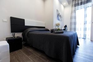 Кровать или кровати в номере B&B Corso Diaz