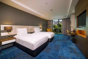 Postel nebo postele na pokoji v ubytování Radisson Blu Hotel, Kayseri