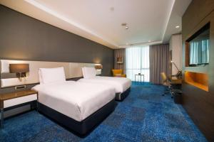 Postel nebo postele na pokoji v ubytování Radisson Blu Hotel, Kayseri