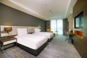 Postel nebo postele na pokoji v ubytování Radisson Blu Hotel, Kayseri