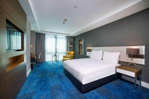 Postel nebo postele na pokoji v ubytování Radisson Blu Hotel, Kayseri