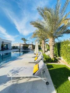 Bazén v ubytování Villa Haut Standing Rock The Kasbah, Djerba Tunisie nebo v jeho okolí