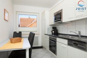 Kuchyň nebo kuchyňský kout v ubytování Haus Sylke 137 - Ferienwohnung 7