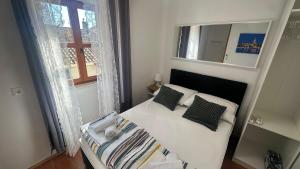 Posteľ alebo postele v izbe v ubytovaní Hostel Split
