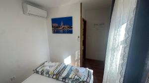 Posteľ alebo postele v izbe v ubytovaní Hostel Split
