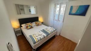 Posteľ alebo postele v izbe v ubytovaní Hostel Split