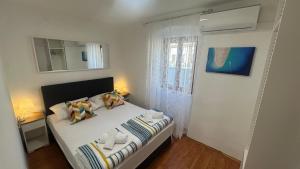 Posteľ alebo postele v izbe v ubytovaní Hostel Split