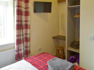 Televiisor ja/või meelelahutuskeskus majutusasutuses Milk Churn - Ukc2400