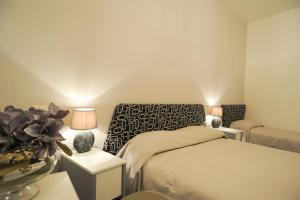 Кровать или кровати в номере B&B Corso Diaz