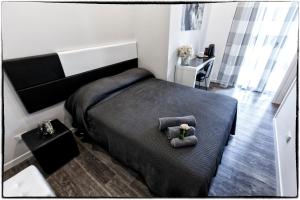 Кровать или кровати в номере B&B Corso Diaz
