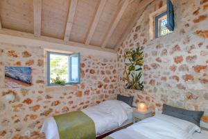 Postel nebo postele na pokoji v ubytování Kuca Del Mar