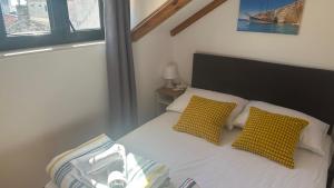 Posteľ alebo postele v izbe v ubytovaní Hostel Split