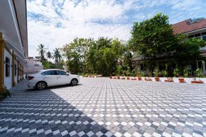 Φωτογραφία από το άλμπουμ του Treebo West Fort Divine - Near Padmanabhaswamy Temple σε Trivandrum