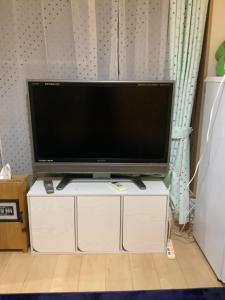Clear Up Guest House的电视和/或娱乐中心