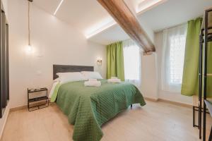 A bed or beds in a room at Soave Country House