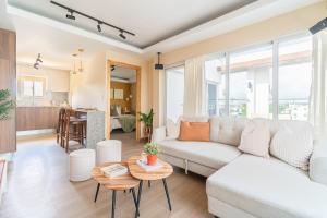 Posezení v ubytování Elegante y versátil apartamento en Ensanche Ozama SDE + 17 fotografií