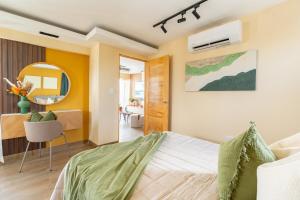Postel nebo postele na pokoji v ubytování Elegante y versátil apartamento en Ensanche Ozama SDE